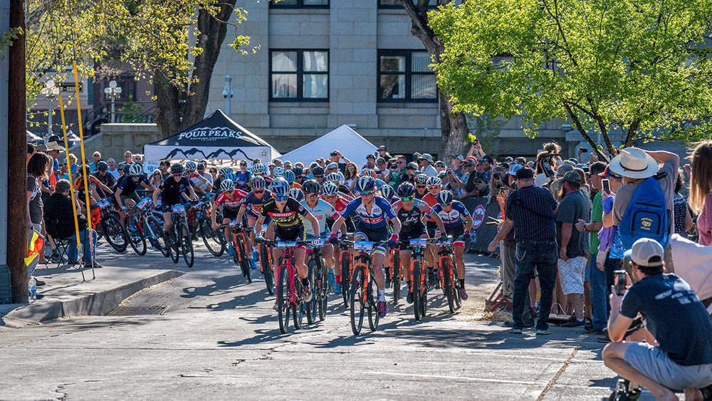 Catharine at the front of a deep women's field at an Epic Rides event.
