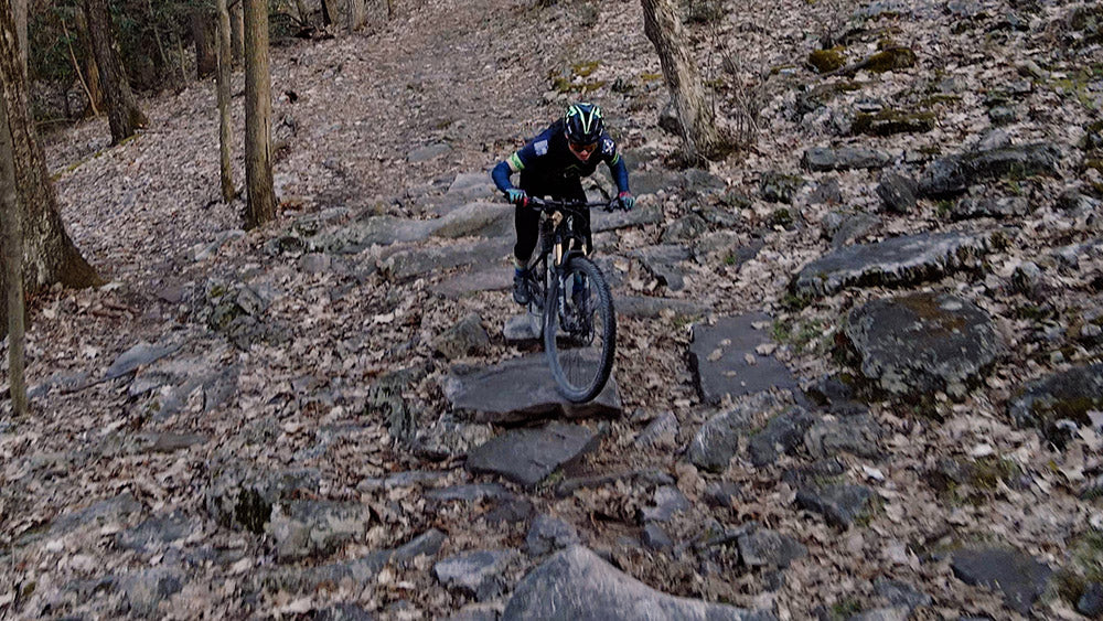 Three Bridges trail in Rothrock State Forest is a challenge for most riders when fresh. Will cleans it here during one of his three attempts.
